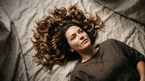 Woman With Wavy Caramel Hair on Linen