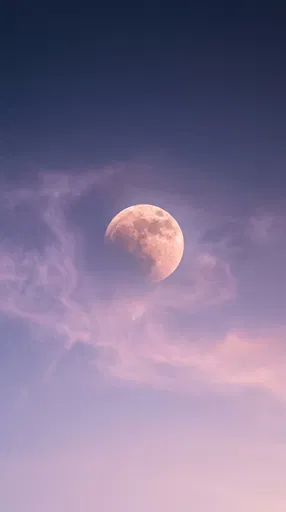 Rose Tinted Lunar Eclipse in Pastel Sky