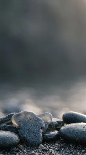 Dark Slate Pebbles With Copy Space