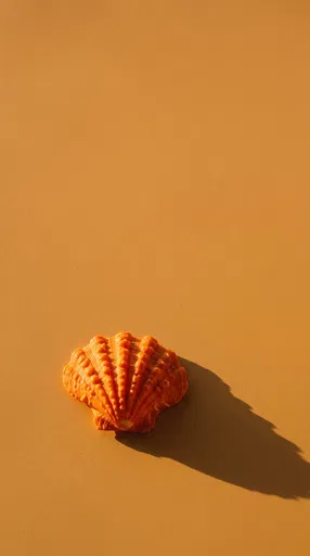 Orange Scallop Shell on Ochre Background