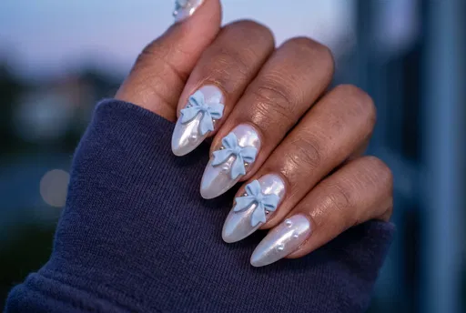 Pearlescent Almond Nails With Blue Bows