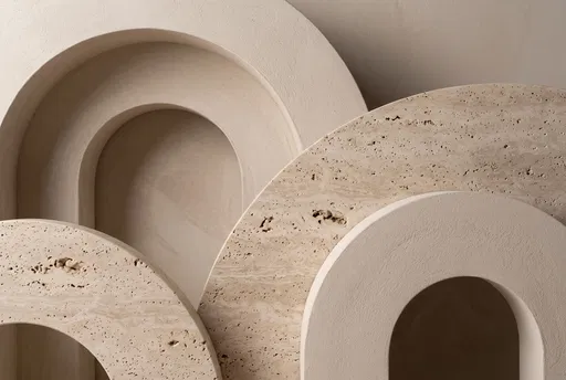 Minimalist Overlapping Plaster and Travertine Arches