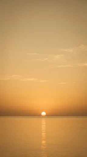 Minimalist Golden Sunset Over Calm Ocean