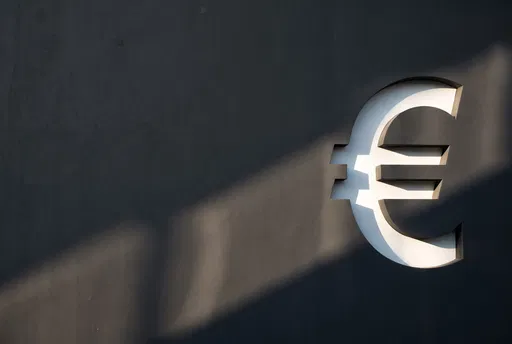 Recessed White Euro Symbol on Dark Wall