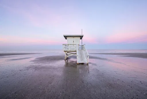 White Lifeguard Tower on Pastel Beach