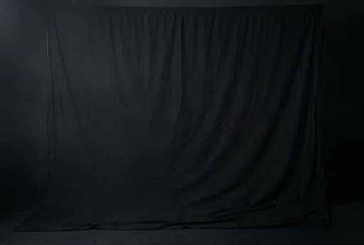 Black Muslin Studio Backdrop in Dark Room