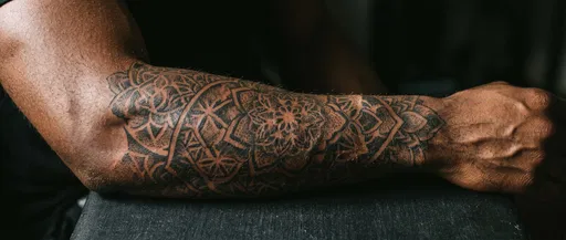 Geometric Mandala Forearm Tattoo Closeup