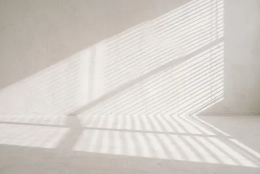 White Plaster Room With Venetian Blind Shadows