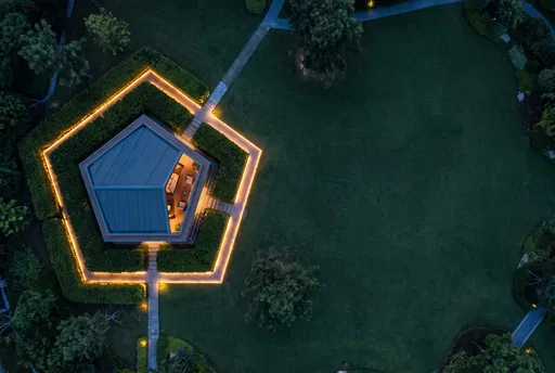 Aerial View of Illuminated Pentagonal Garden Pavilion