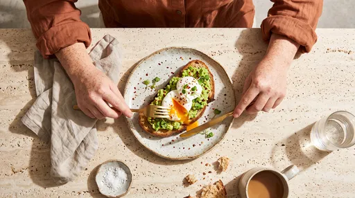 Overhead View of Person Eating Avocado Toast