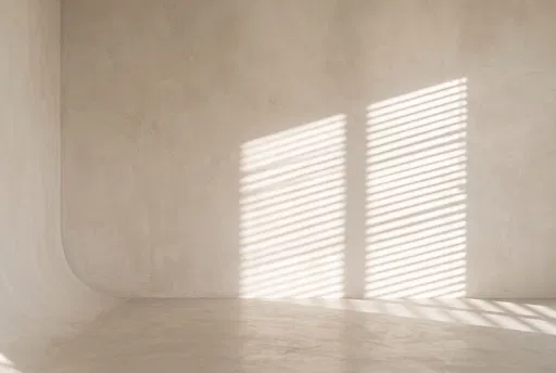 Minimalist Plaster Studio Wall with Blind Shadows