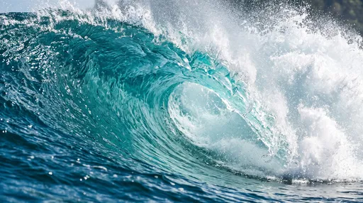 Turquoise Ocean Wave Curling in Sunlight