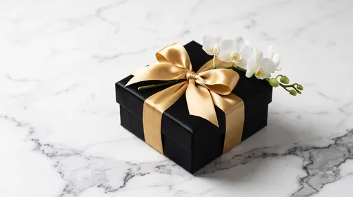 Black Gift Box With Gold Ribbon