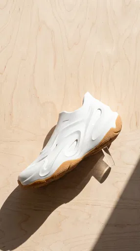 White Molded Foam Sneaker on Wood