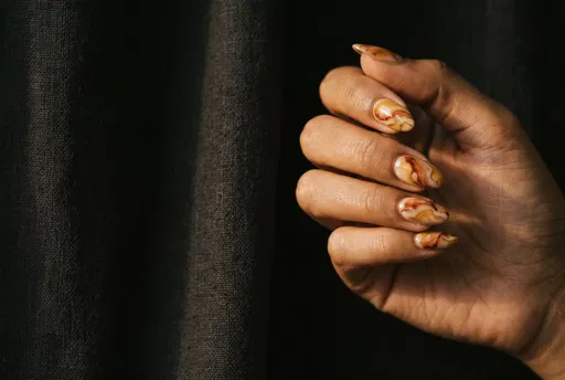 Hand With Warm Marble Nail Art
