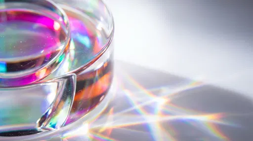 Macro Dichroic Glass Lenses with Rainbow Caustics