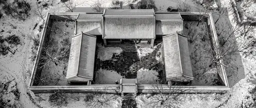 Aerial View of Snowy Chinese Courtyard