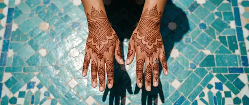 Hands With Henna Over Turquoise Mosaic Tiles