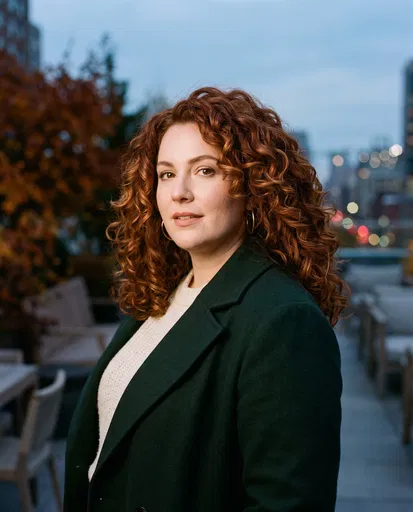Woman With Curly Auburn Hair at Dusk