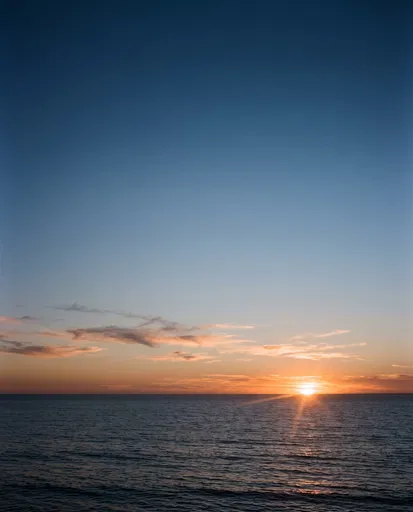 Calm Ocean Horizon at Sunset