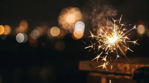 Burning Sparkler at Night with Bokeh