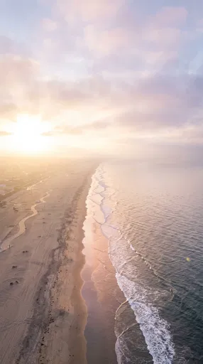 Aerial Sunrise Over Misty California Coastline