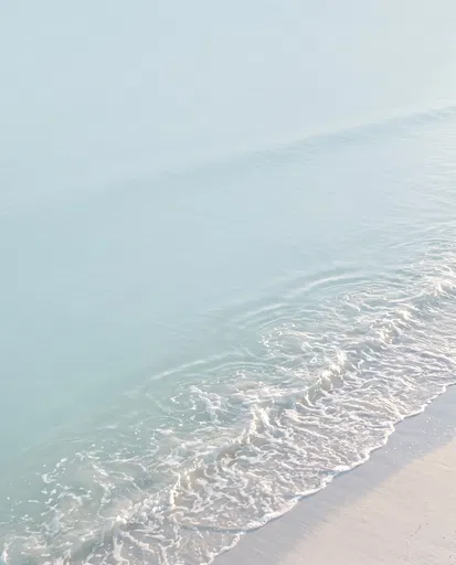 Minimalist Pastel Ocean Waves on Pale Sand