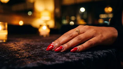 Red Almond Nails with Cuticle Rhinestones