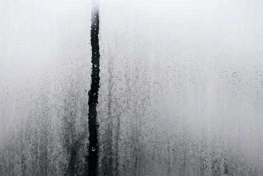 Water Droplet Trail on Steamed Glass