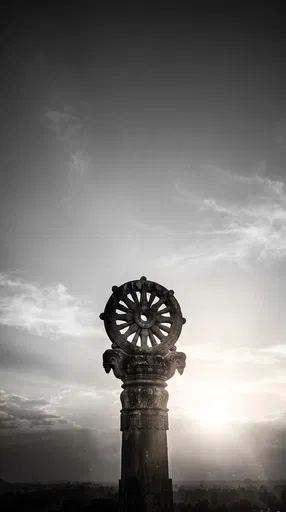 Monochrome Stone Dharma Wheel Pillar