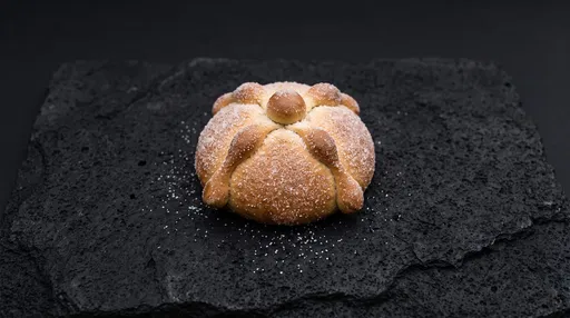 Mexican Pan de Muerto on Black Stone