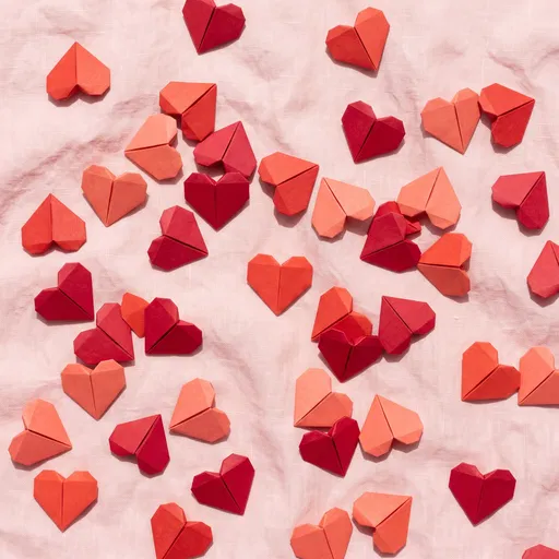 Red and Coral Origami Hearts Flat Lay