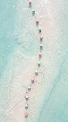 Aerial View of Pastel Coastal Buoys