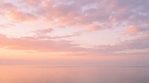 Pastel Pink Dawn Over Calm Sea