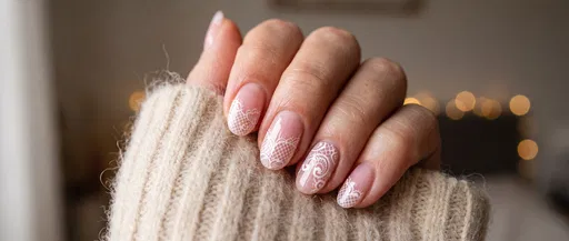 Pink Manicure With White Lace Art
