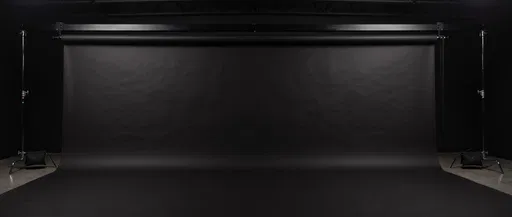 Black Seamless Paper Backdrop in Dark Studio