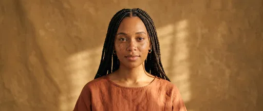 Portrait of Young Woman with Braids