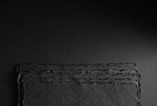 Stacked Black Textured Cardstock Background