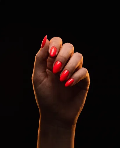 Hand With Glossy Red Nails