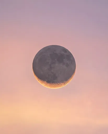Crescent Moon in Pastel Twilight Sky