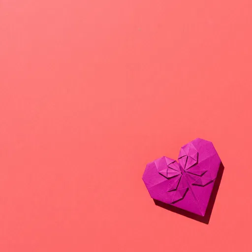 Magenta Origami Heart on Coral Background