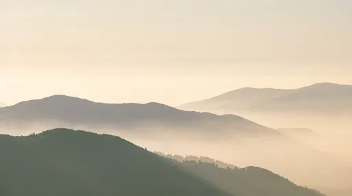 Misty Mountain Ridges at Sunrise