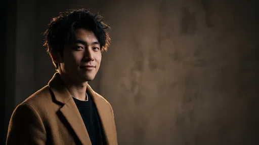 Moody Portrait of Young Man in Coat