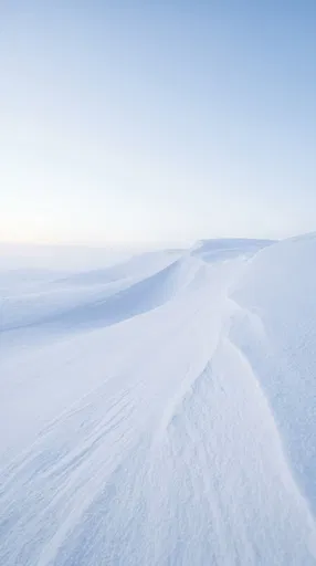 Minimalist White Snow Dunes Under Clear Sky