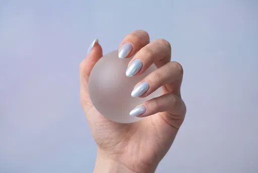 Blue Pearl Nails Holding Frosted Glass Sphere