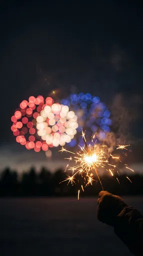 Burning Sparkler With Red White Blue Bokeh