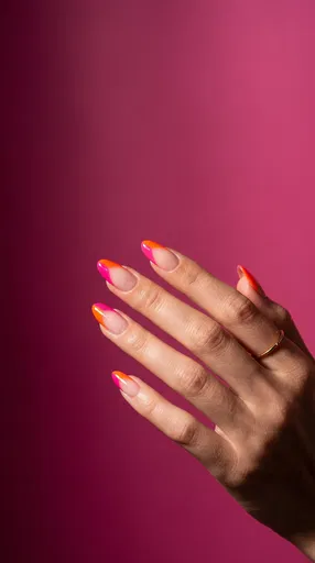 Hand With Pink And Orange Manicure