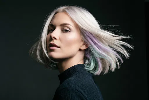Woman With Platinum Bob and Pastel Highlights