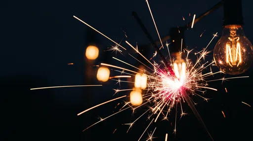 Glowing Sparkler and Warm String Lights