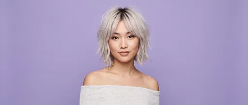 Woman With Platinum Blonde Shaggy Bob